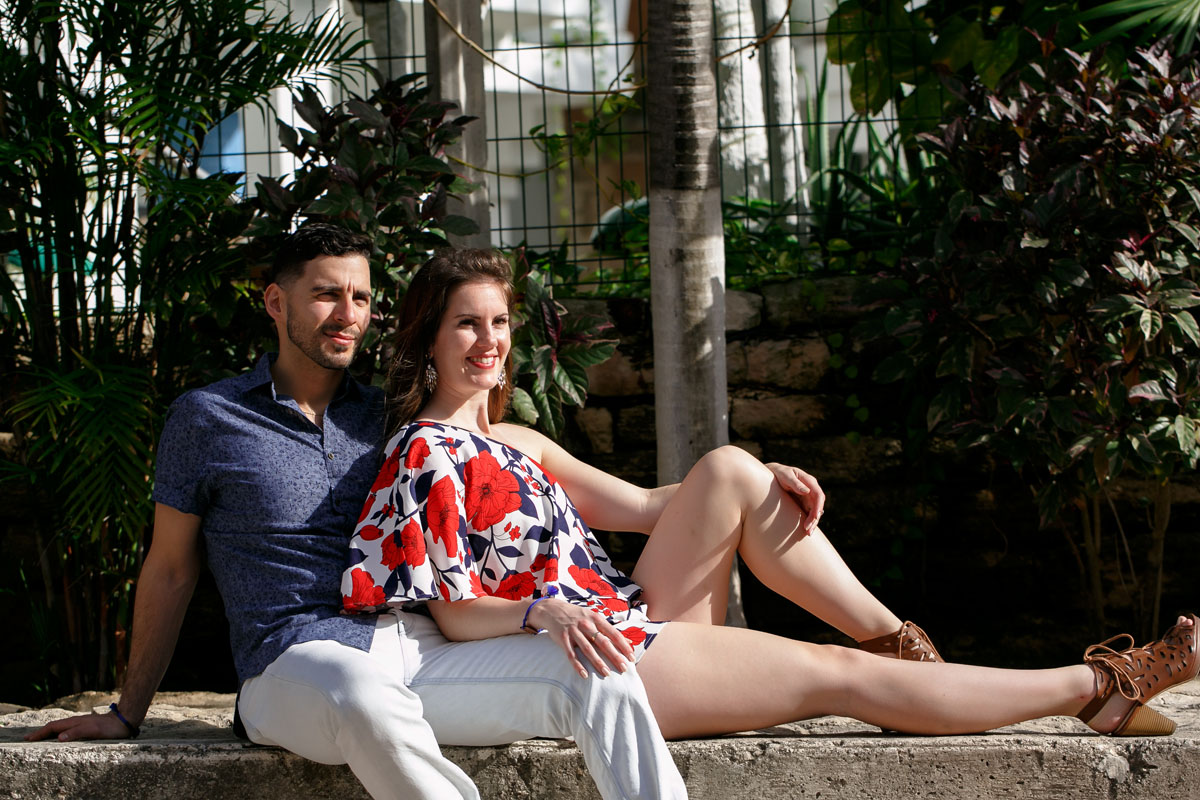 CoupleReclinesOnWall