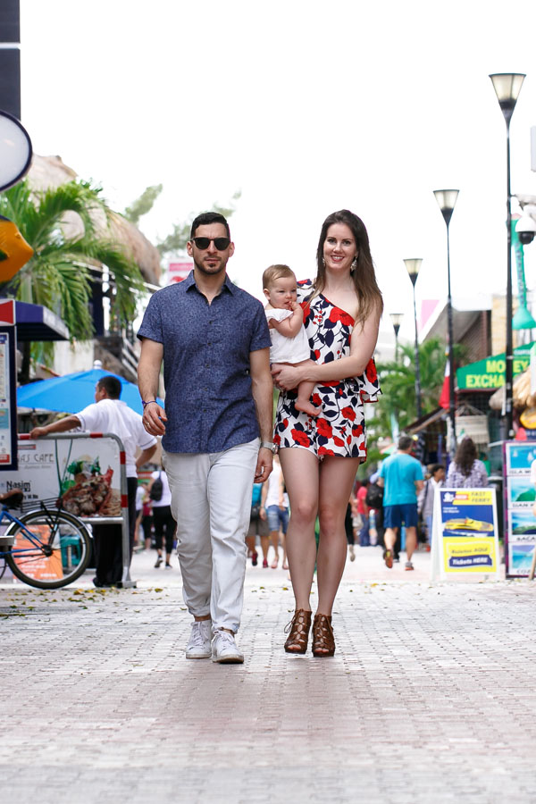 ProudParentsStrollStreetWithBaby