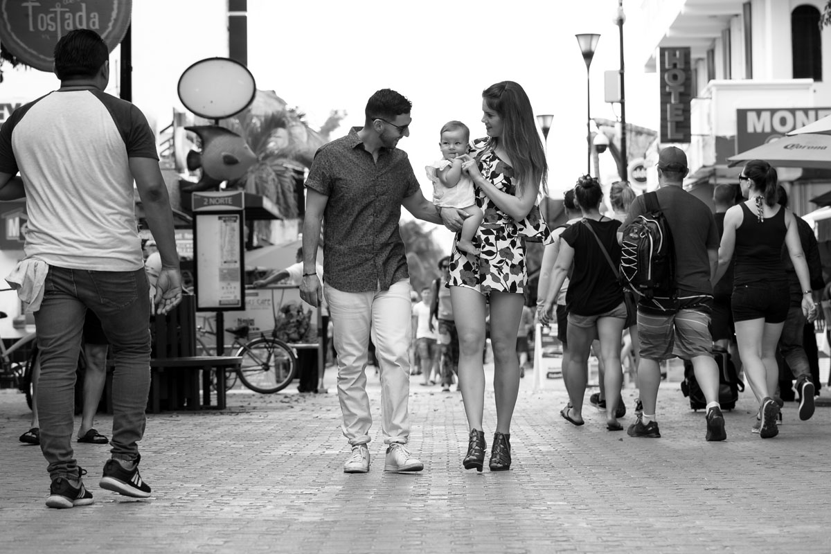 ProudParentsStrollStreetWithBaby