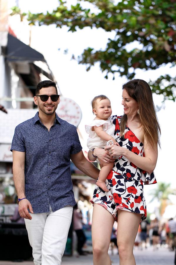 MamaCarriesBabyOnStreetwalk