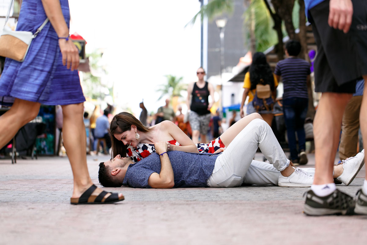CoupleReclineOnBusyStreet