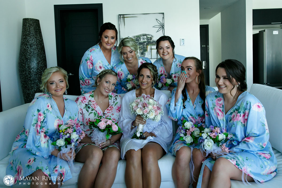 SmilingBridalEntourageHoldingBouquets