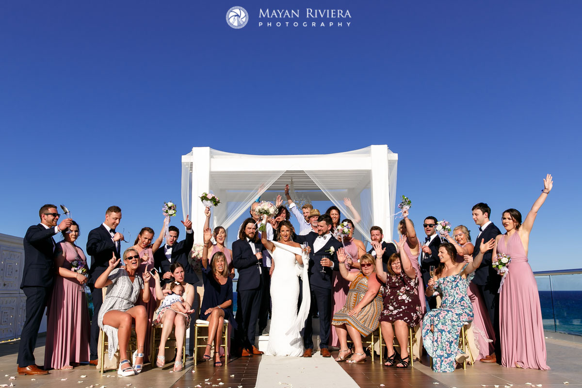 WeddingGuestsCheerNewlyweds