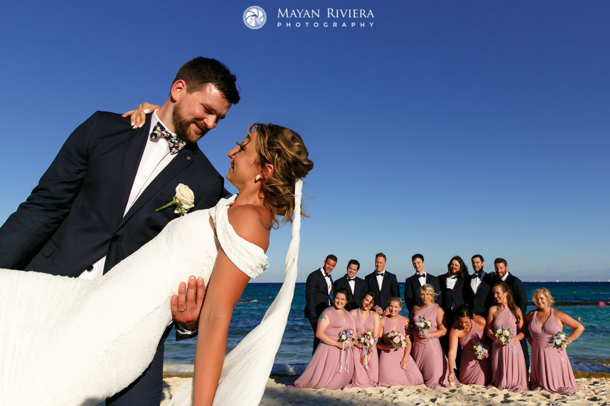 NewlywedsDipInFrontOfAttendants