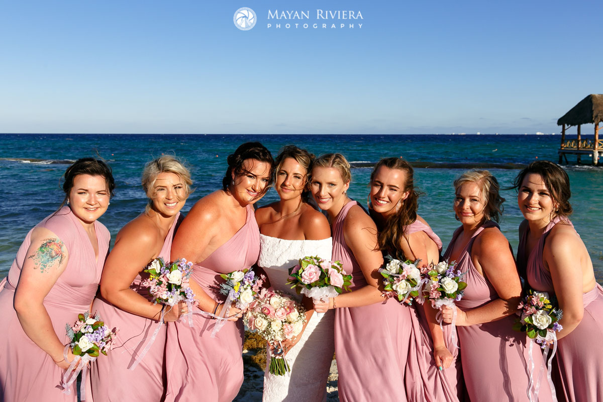 BridePosesWithBridesmaidsOnBeach