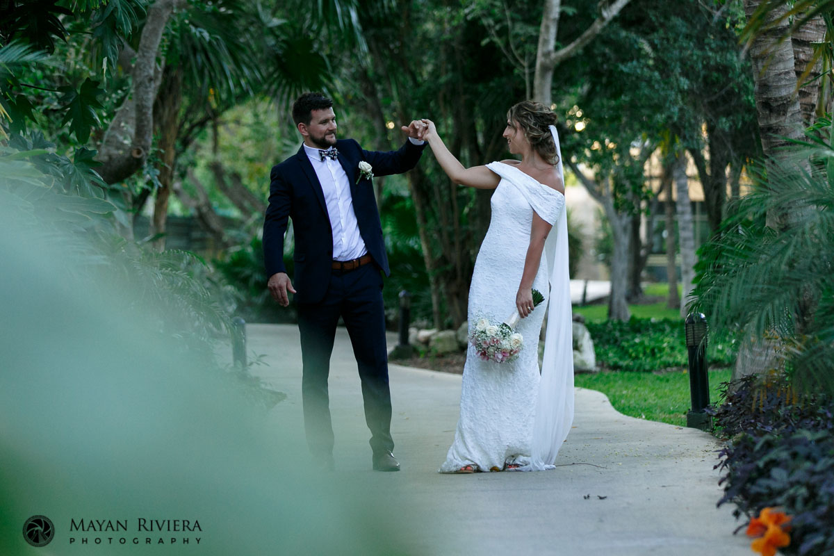 NewlywedsDanceOnGardenPath
