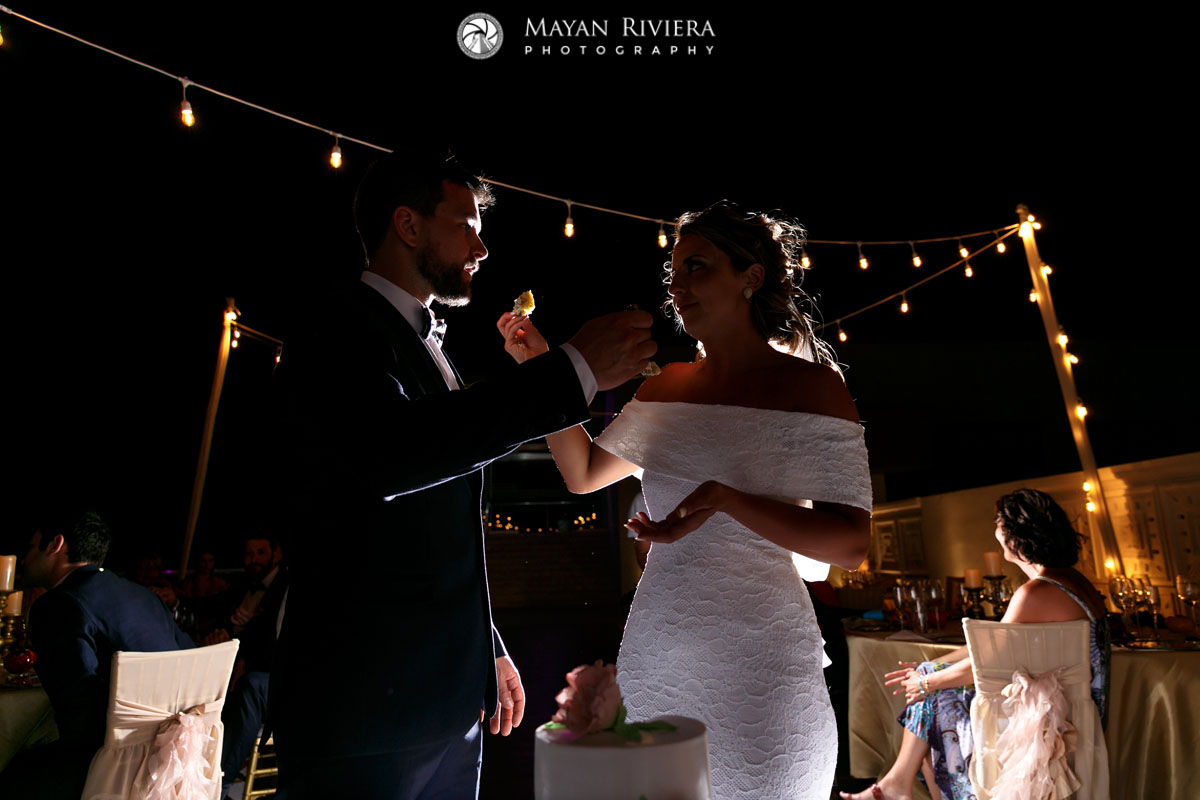 NewlywedsFeedEachOtherCake