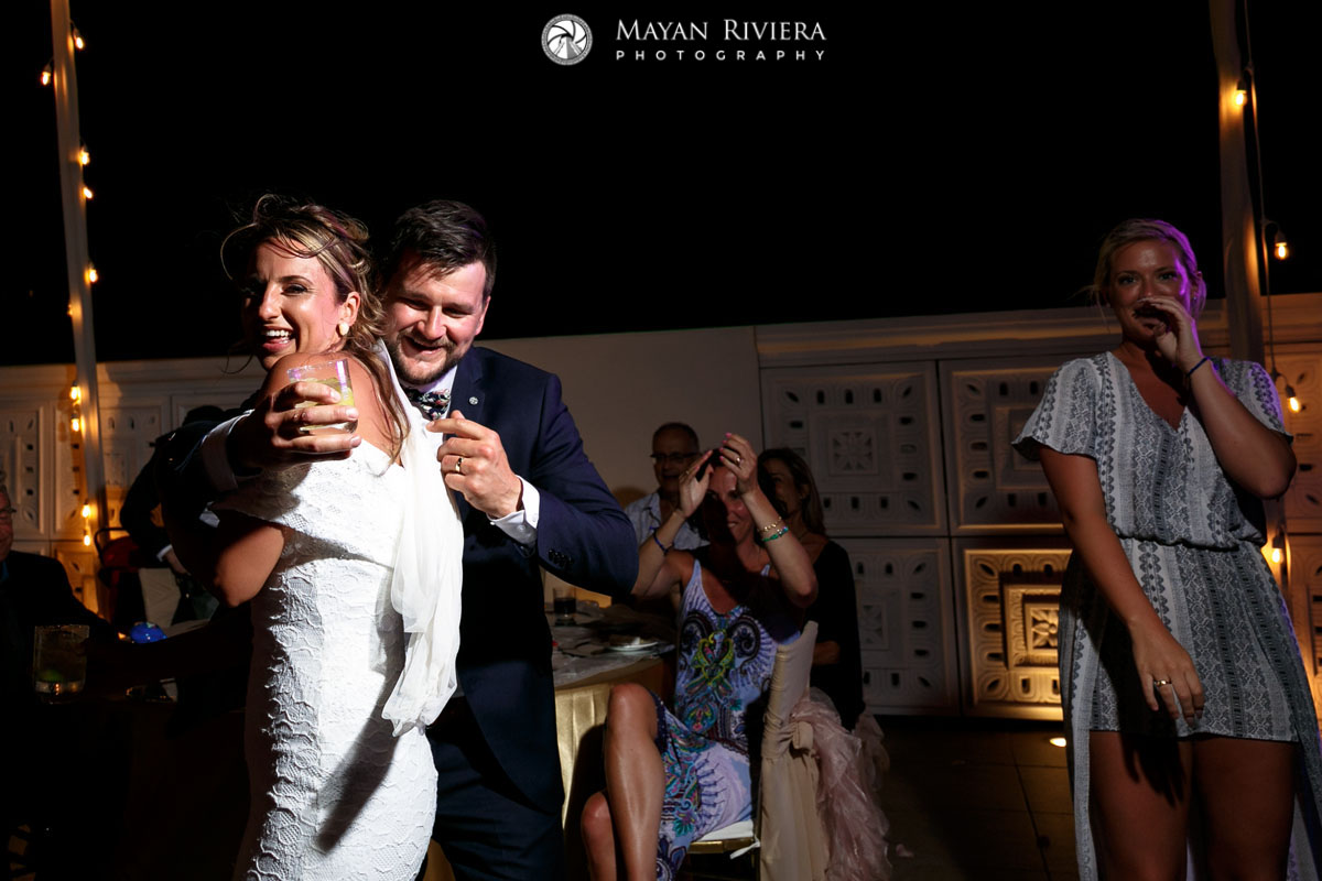 LaughingNewlywedsClownAtReception