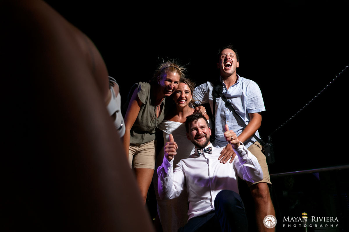 PhotographerLaughsWithNewlyweds
