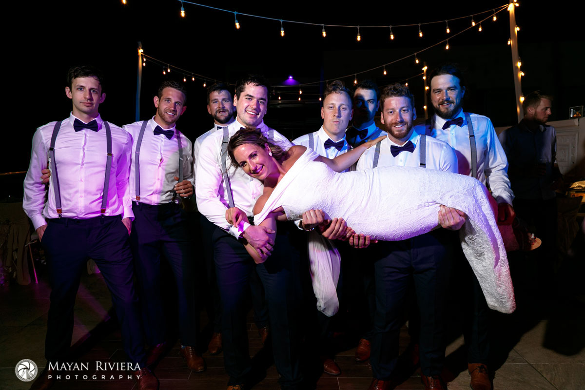 GroomsmenHoistBrideInTheirArms