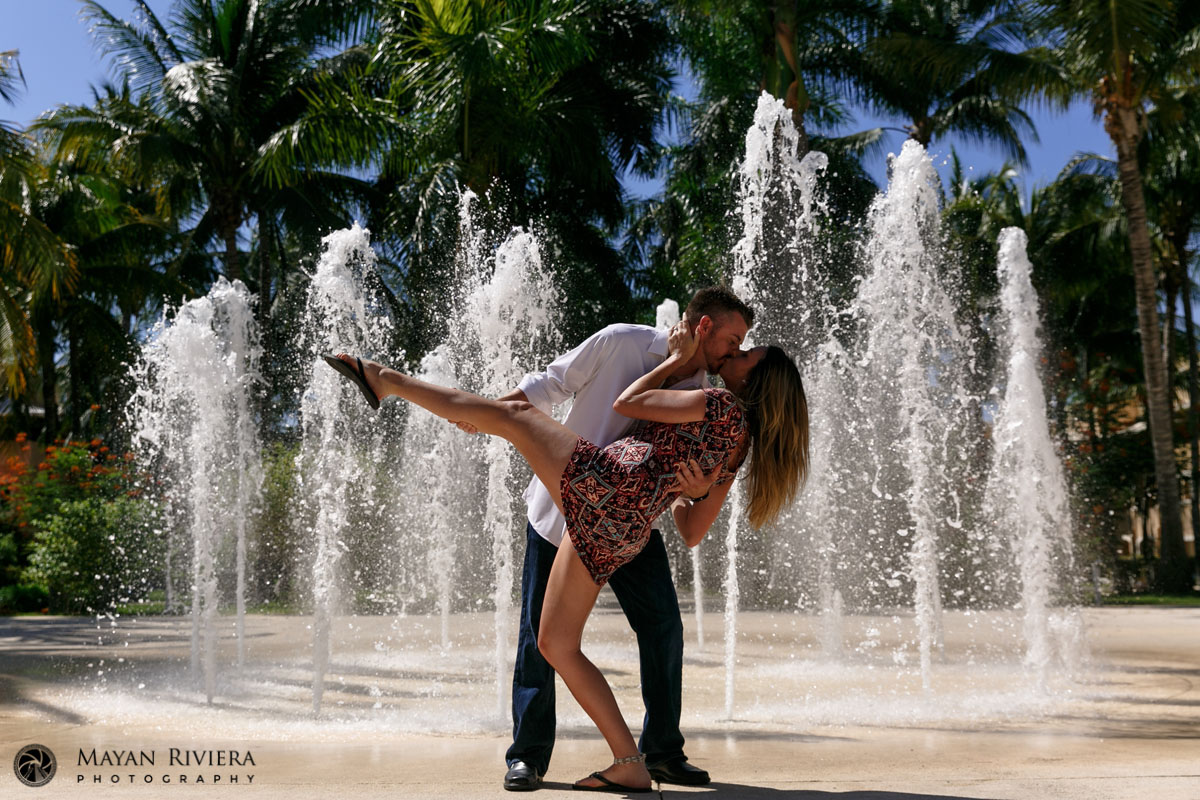 Jason dips Caitlin in a kiss by the Barcelo fountains
