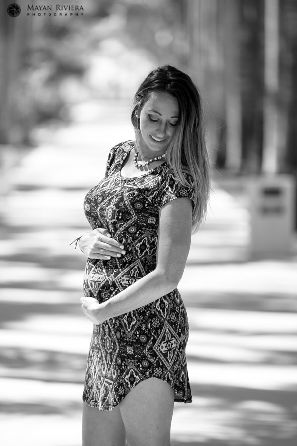 CaitlinCradlesHerBabyBump