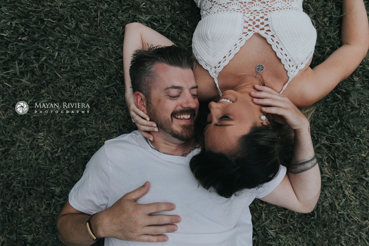 CoupleTouchesEachOthersNecksOnLawn