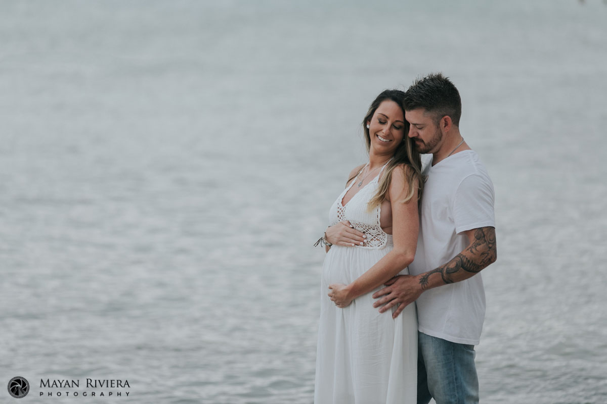 JasonEmbracesCaitlinStandingOnRock