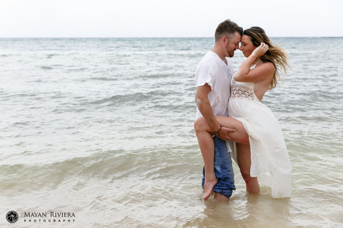 CoupleEmbracesStandingInOcean