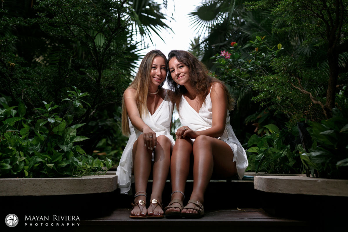 SmilingSistersPoseOnSteps