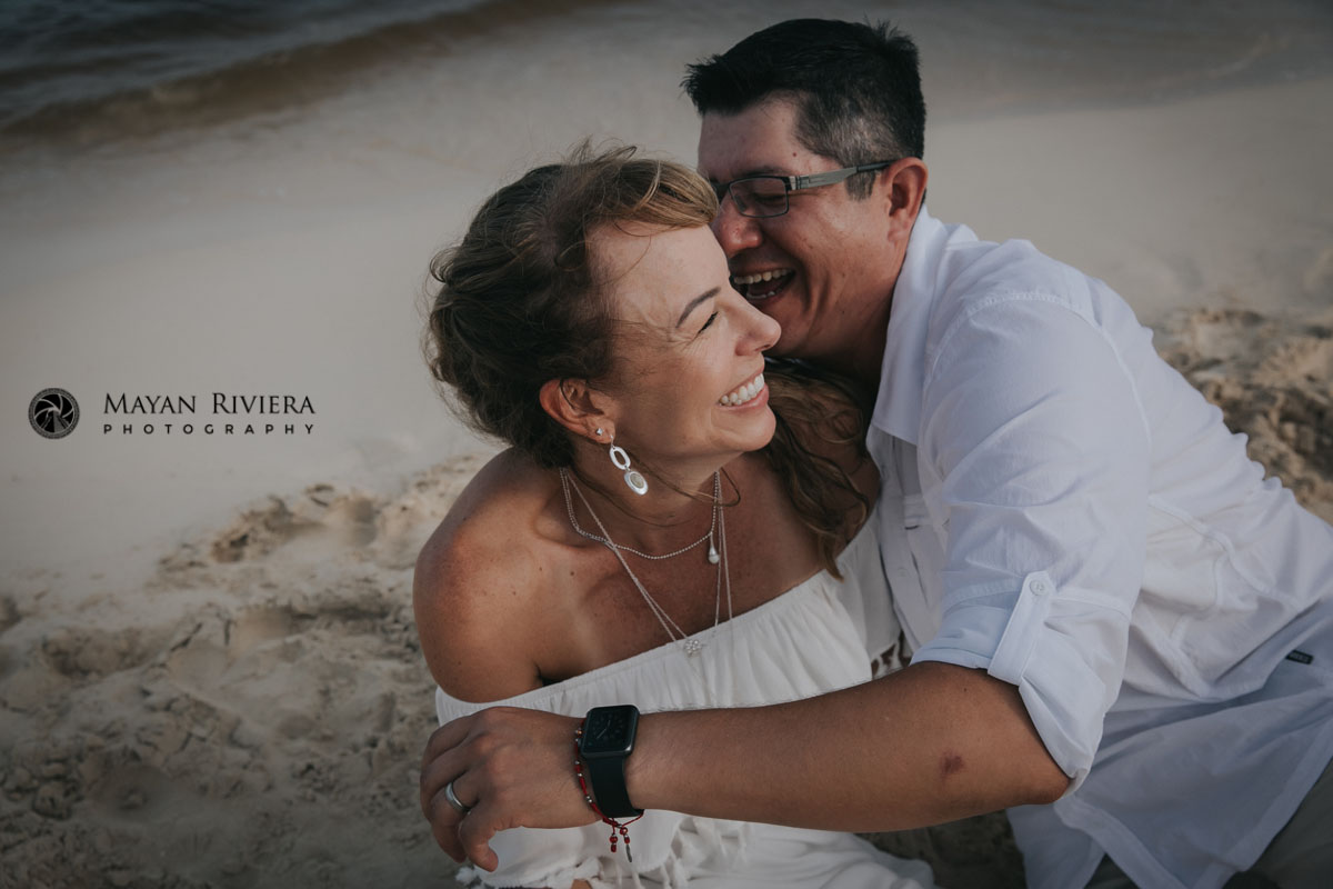 LaughingParentsPoseOnBeach