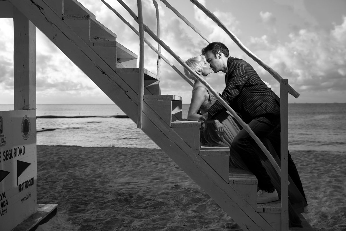 GitaAndAlanEmbraceOnTowerStairs