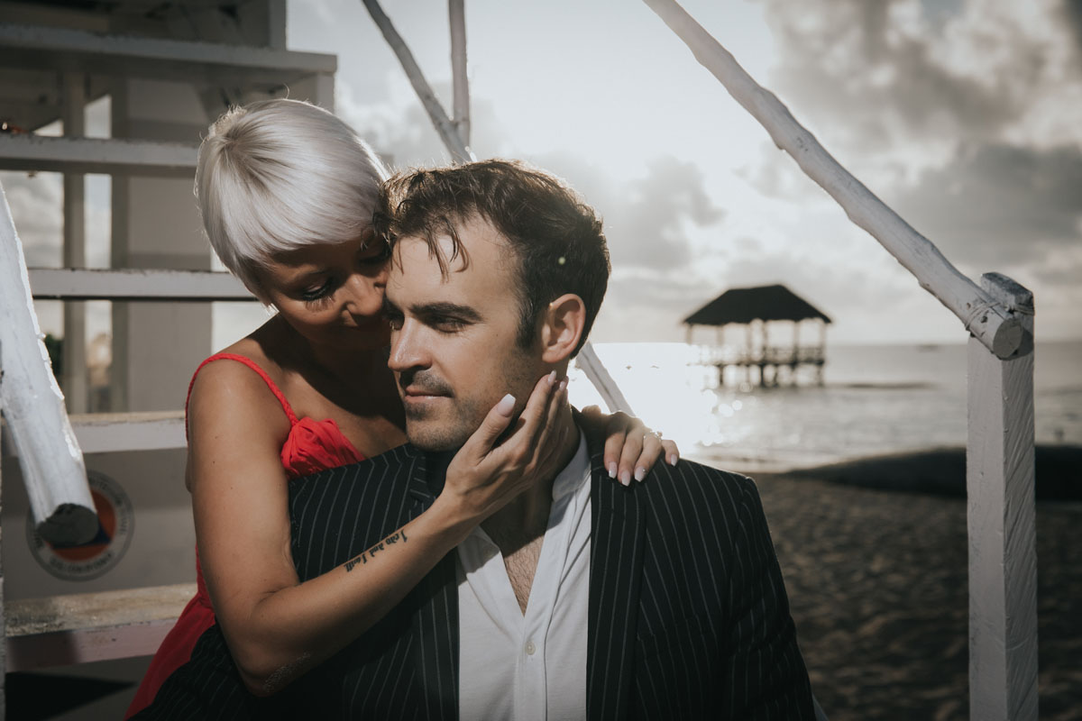 GitaAndAlanEmbraceOnTowerStairs