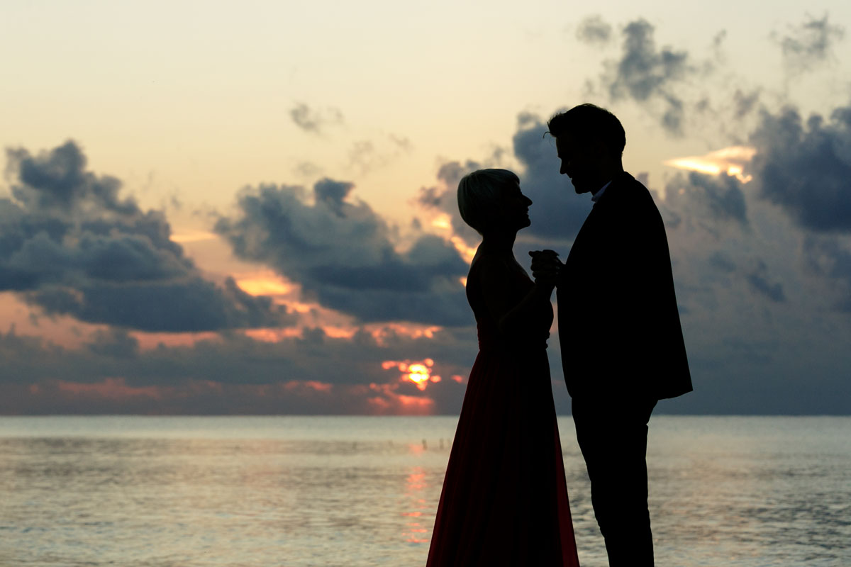 GitaAndAlanShilouettedBySunrise