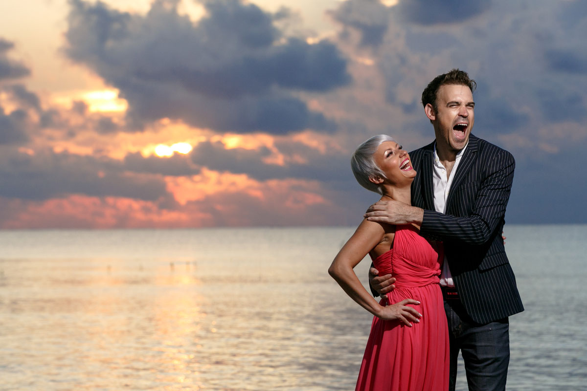 GitaAndAlanLaughTogetherOnBeach