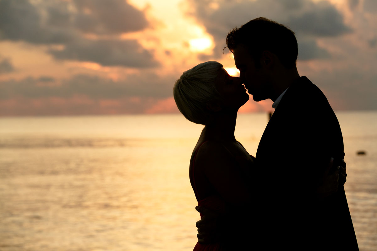 GitaAndAlanShilouettedBySunrise