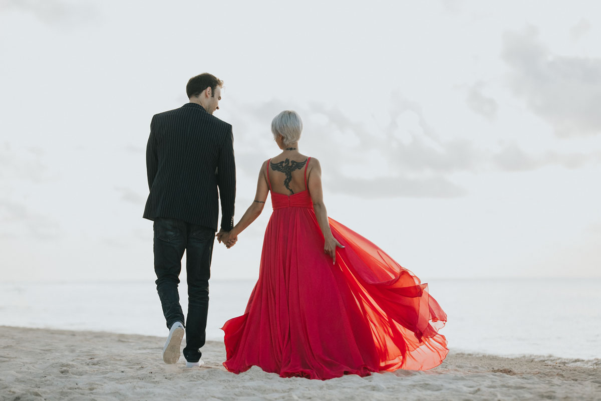 GitaAndAlanStrollBeachAtSunrise