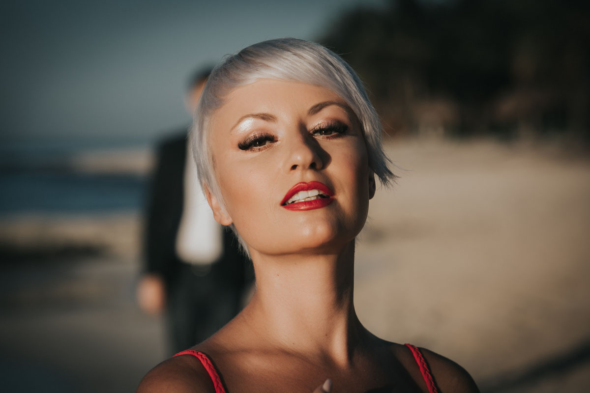 GitaPosesOnBeachtAtSunrise