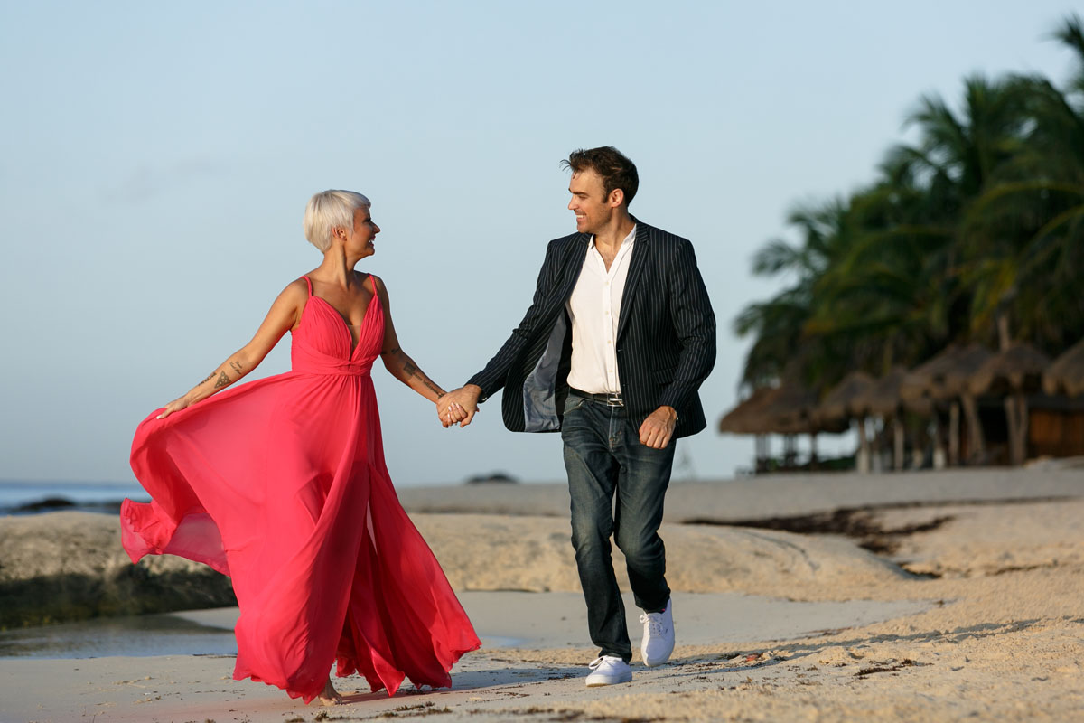 GitaAndAlanStrollBeachAtSunrise