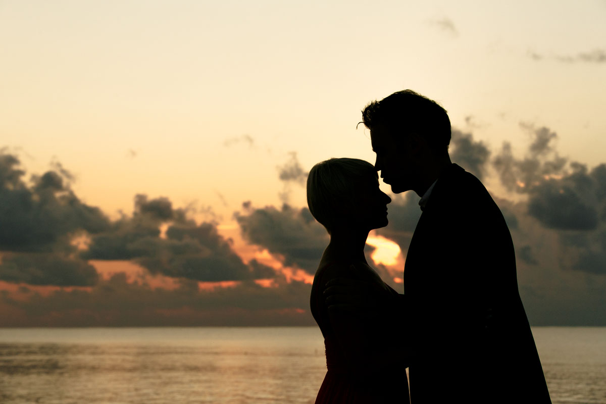 GitaAndAlanShilouettedBySunrise