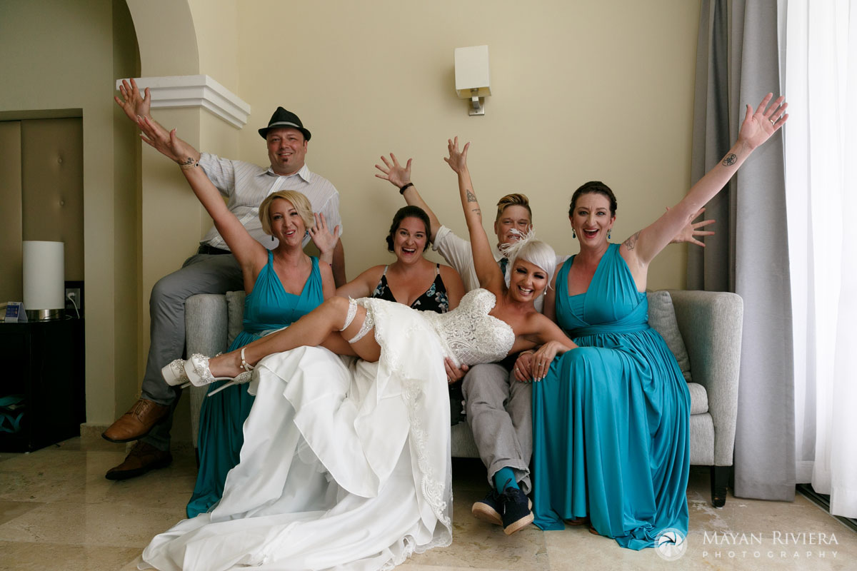 CheeringEntourageHoldsRecliningGita