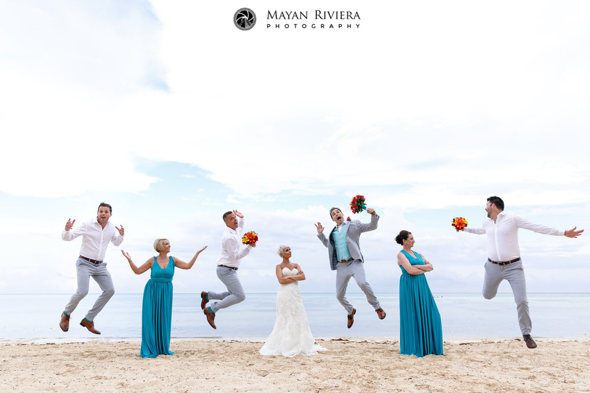 GuysJumpForJoyOnBeach