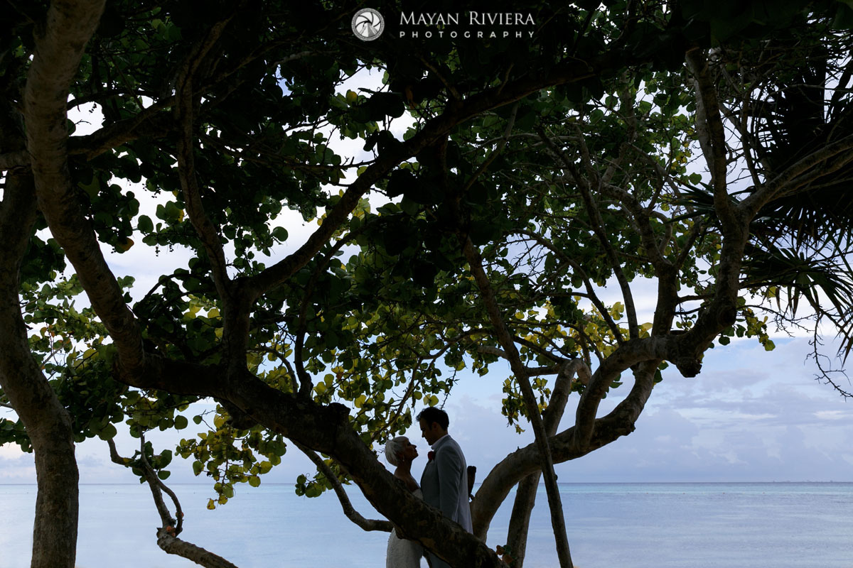 NewlywedsGazeAtEachOtherOnBeach