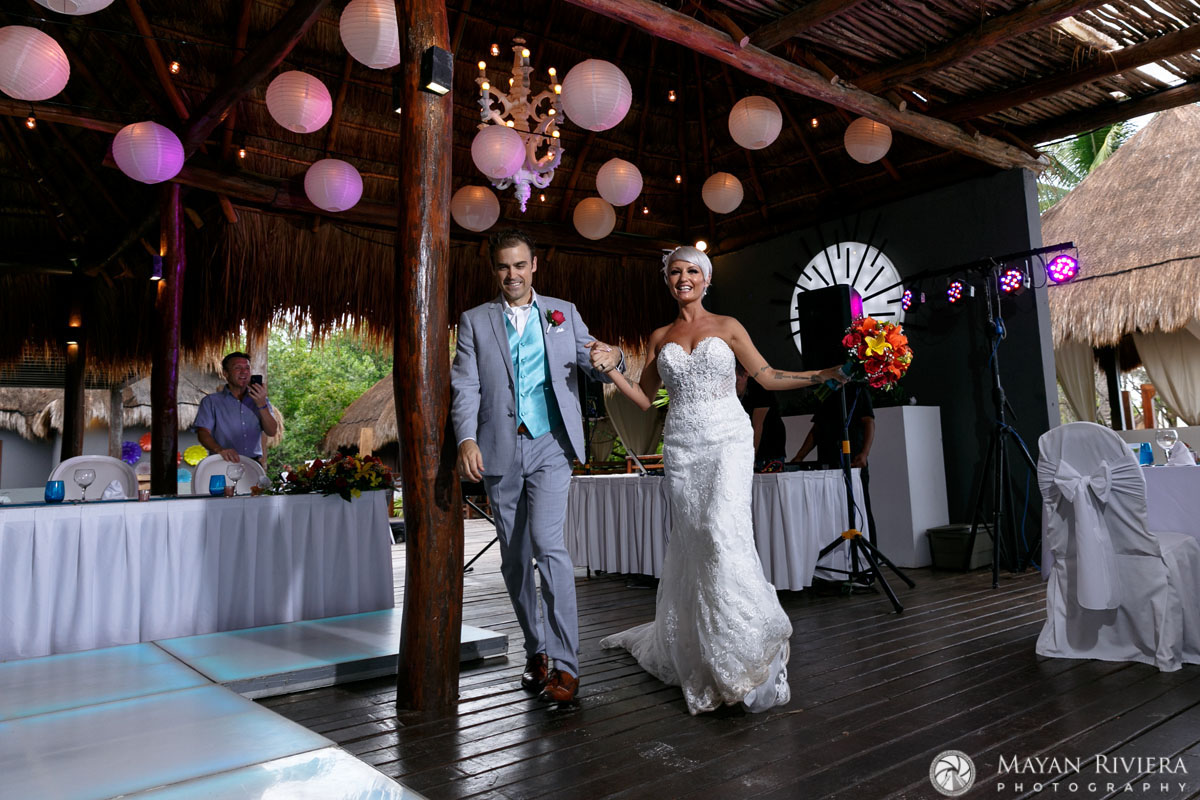 NewlywedsArriveAtReception