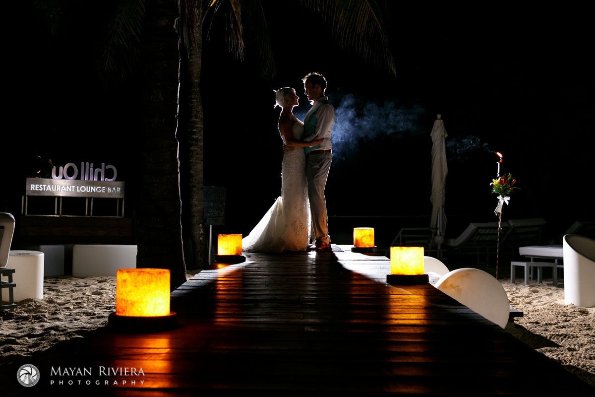 NewlywedsEmbraceInSmokyShilouette