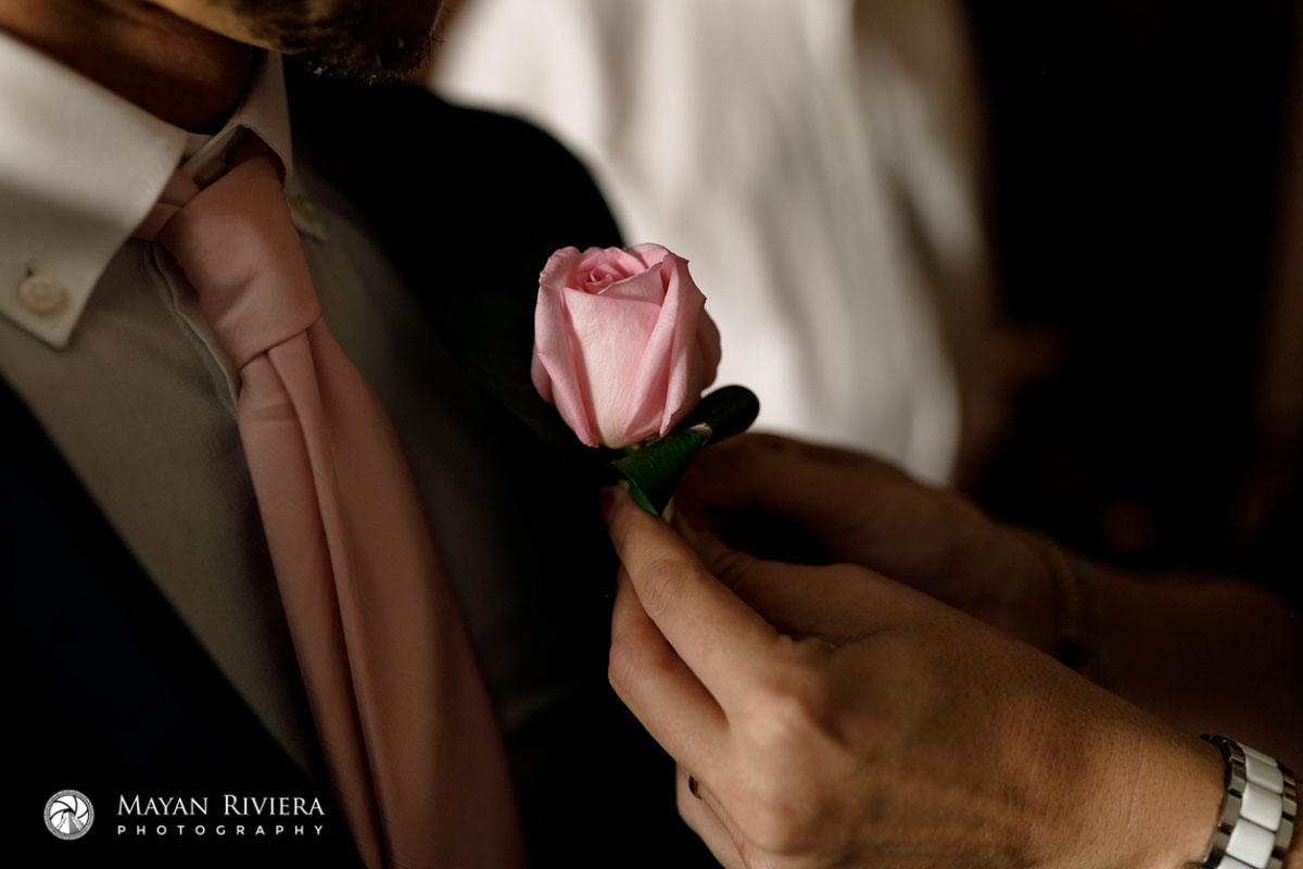 PuttingOnPinkRoseBoutineer