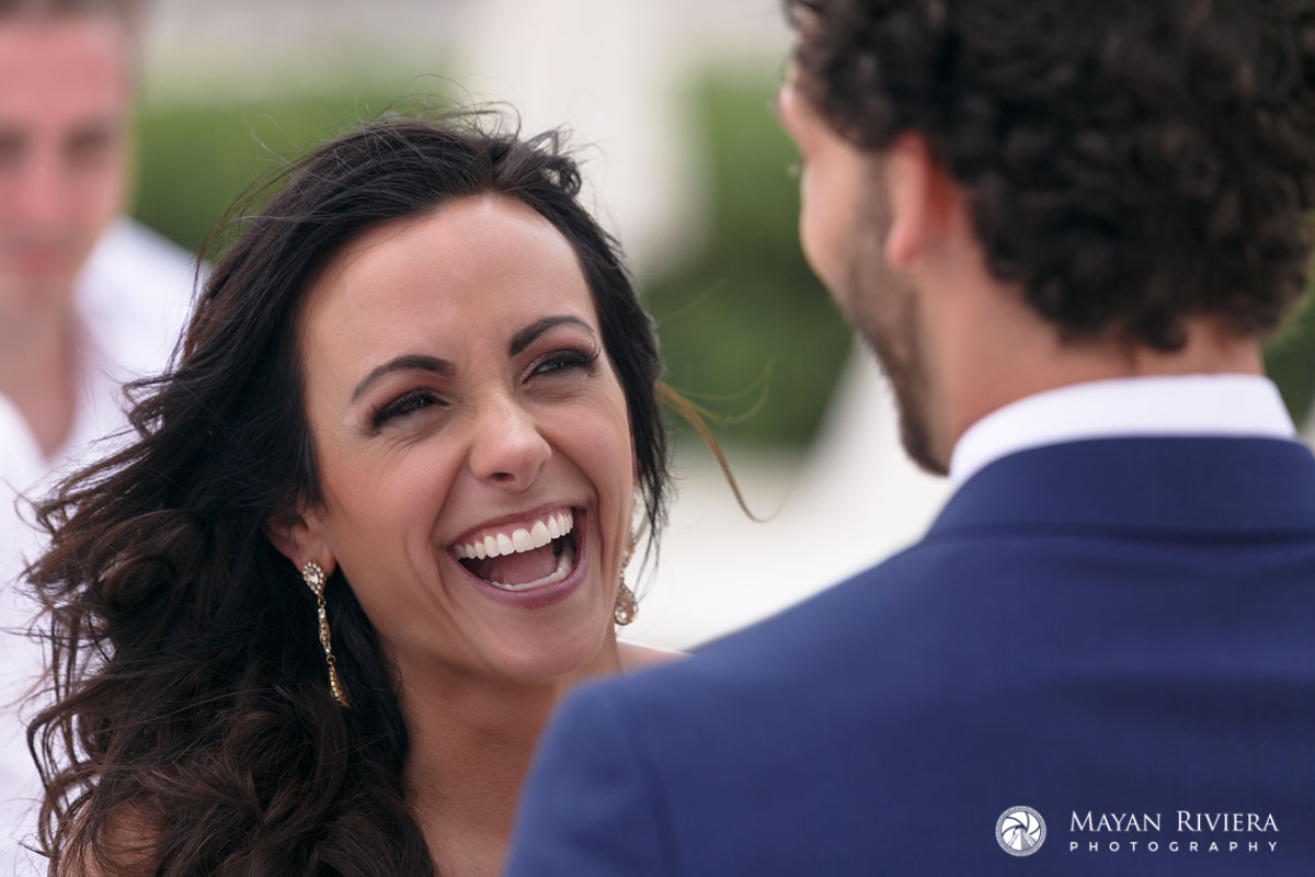 LaughingBrideLooksAtGroom