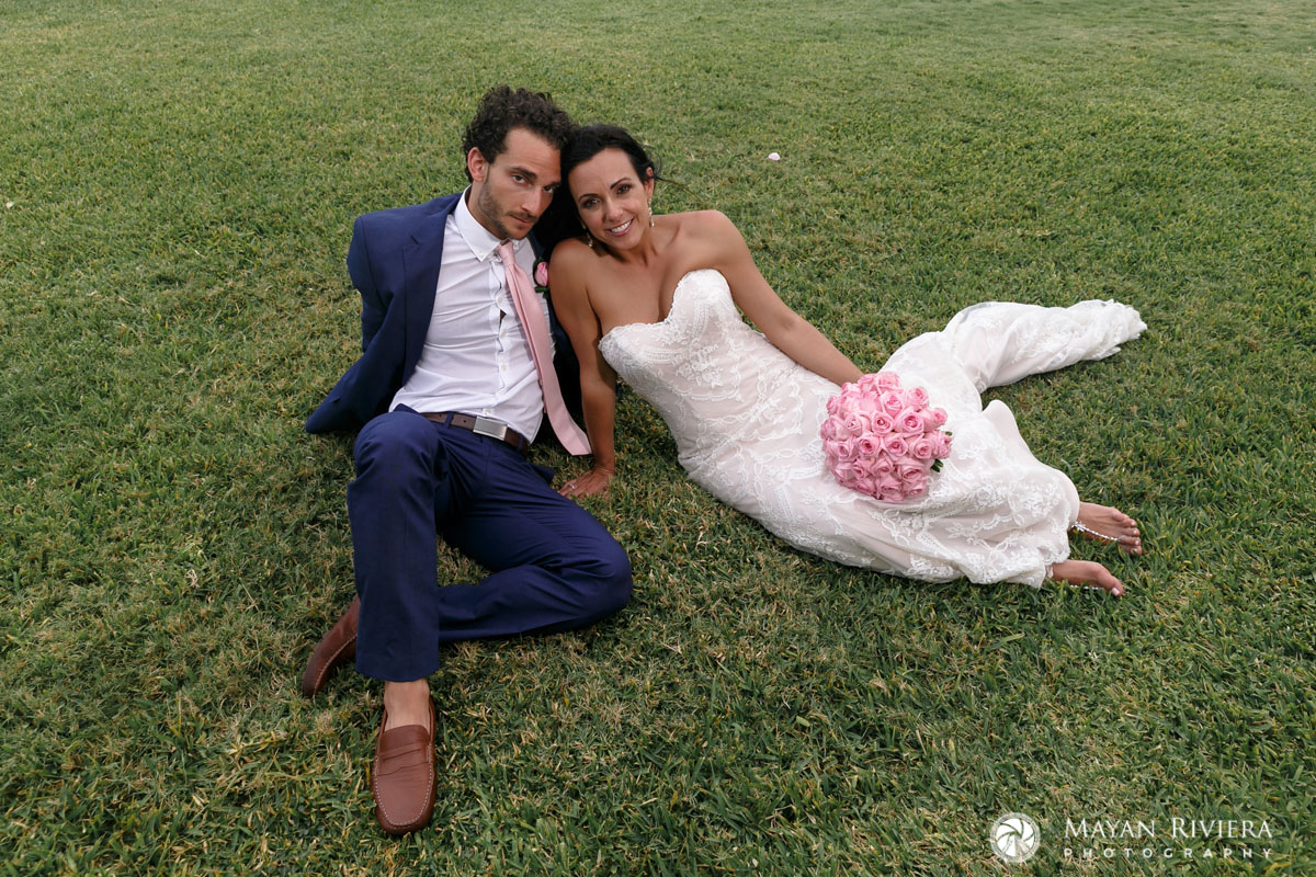 NewlywedsSitOnLawn