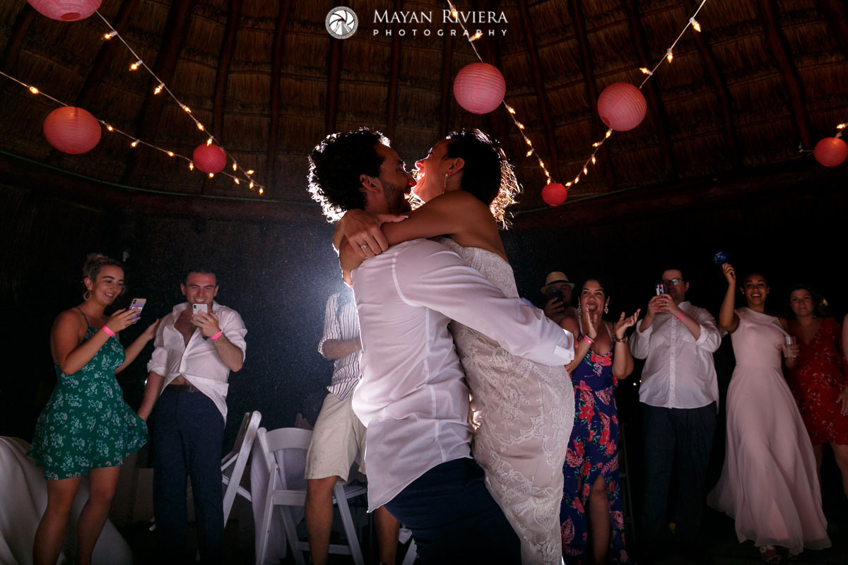 GroomLiftsBrideInHisArms