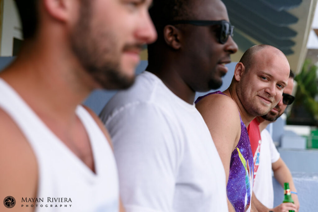 GroomWithGroomsmenOnBalcony