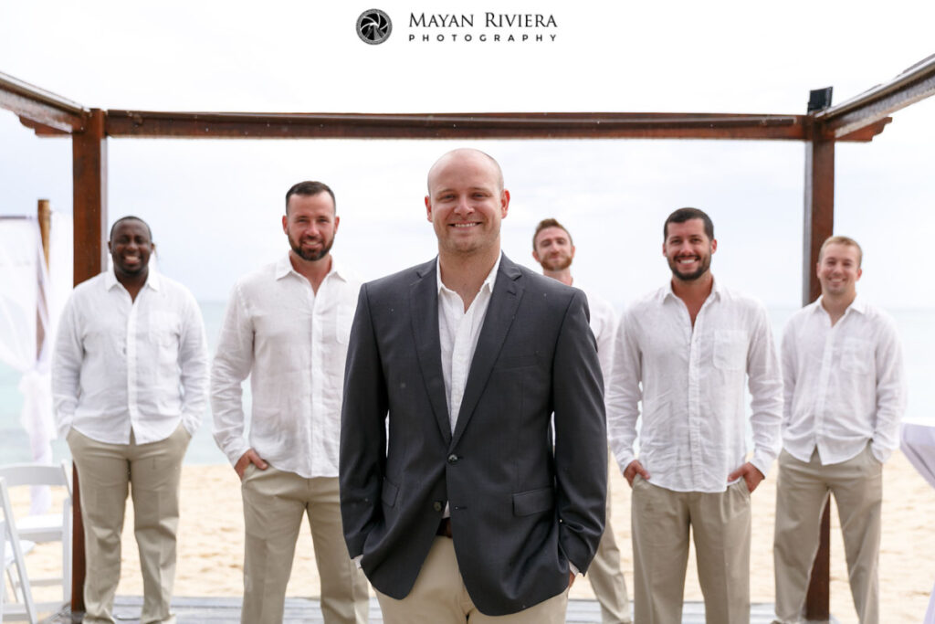 GroomsmenStandBehindGroom