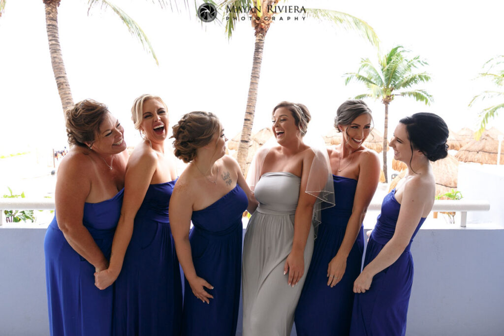 LaughingWeddingPartyOnBalcony