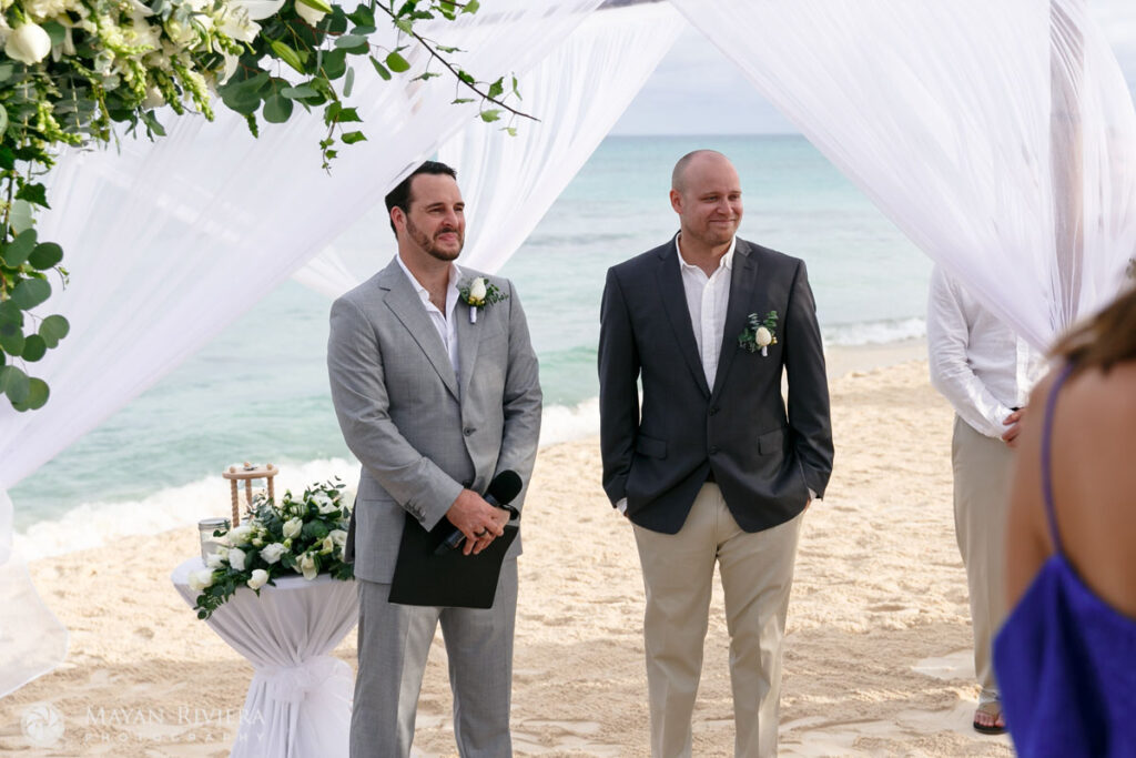 GroomWaitsWithOfficiantAtCeremonySite