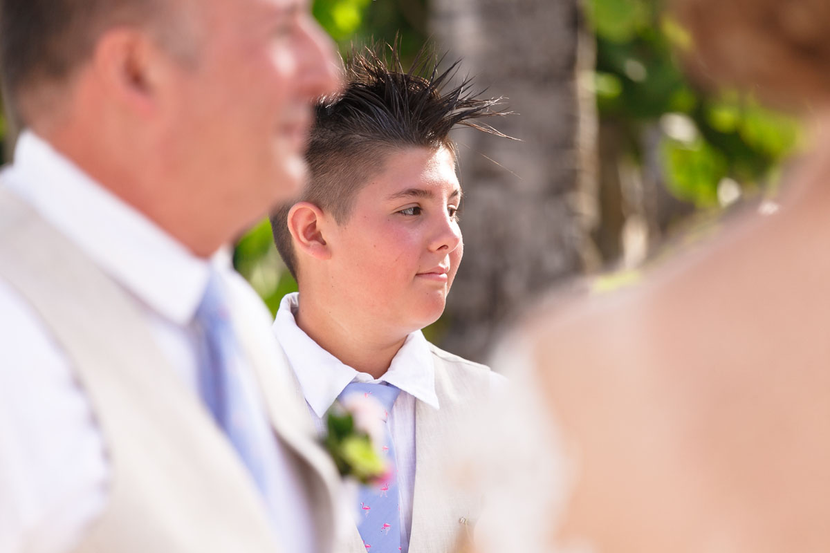 SonStandsAtParentsWedding