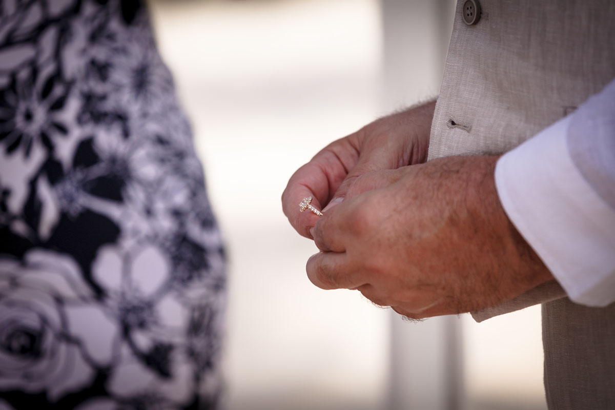 GroomHoldingWeddingRing