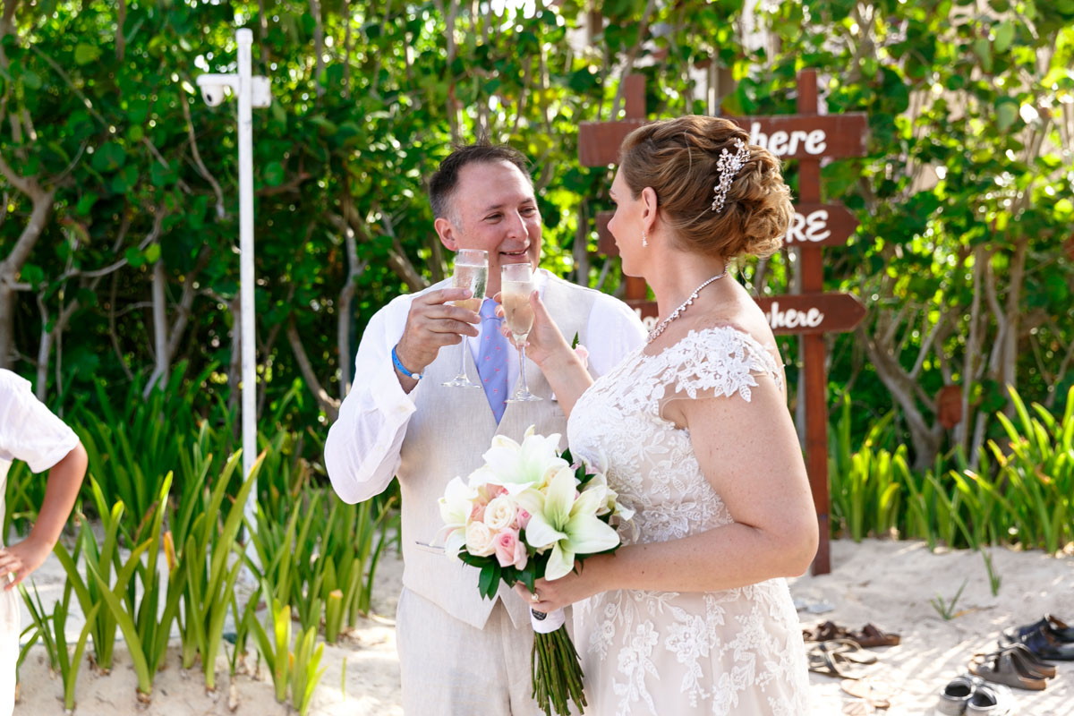 NewlywedsToastAtIberostarTucanBeachsideWedding