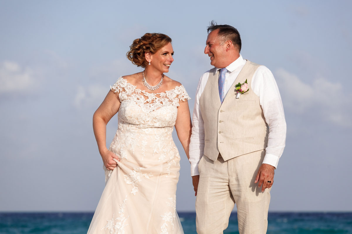 NewlywedsPoseOnBeach