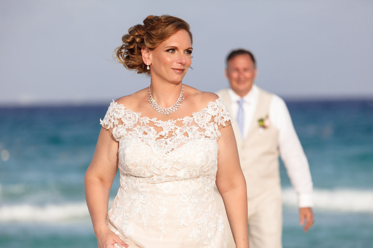 NewlywedsPoseOnBeach