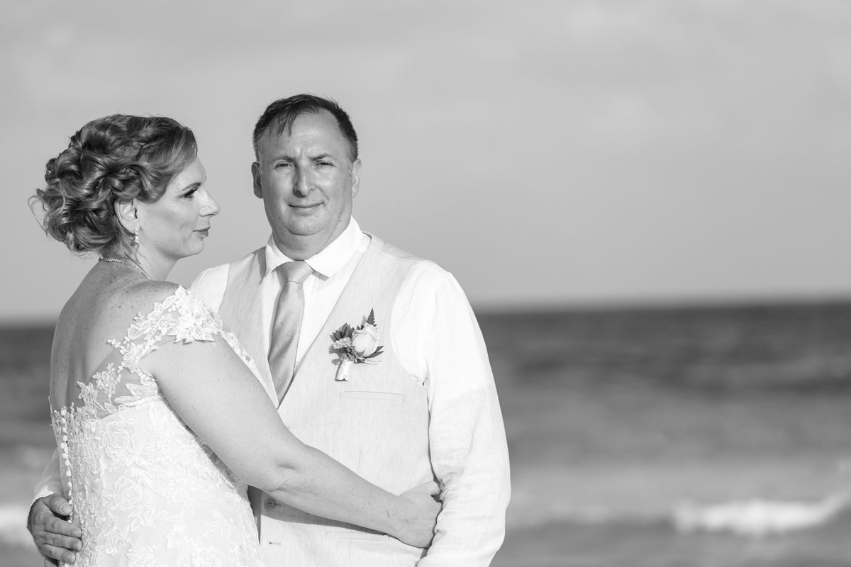 NewlywedsPoseOnBeach