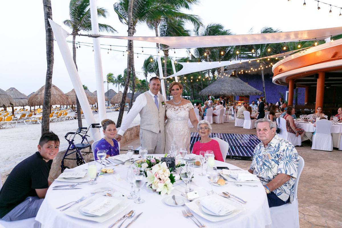 NewlywedsPoseWithFamily